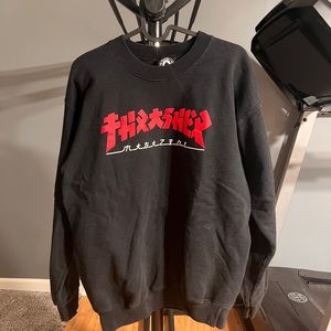 Thrasher black sweatshirt with red writing size small.